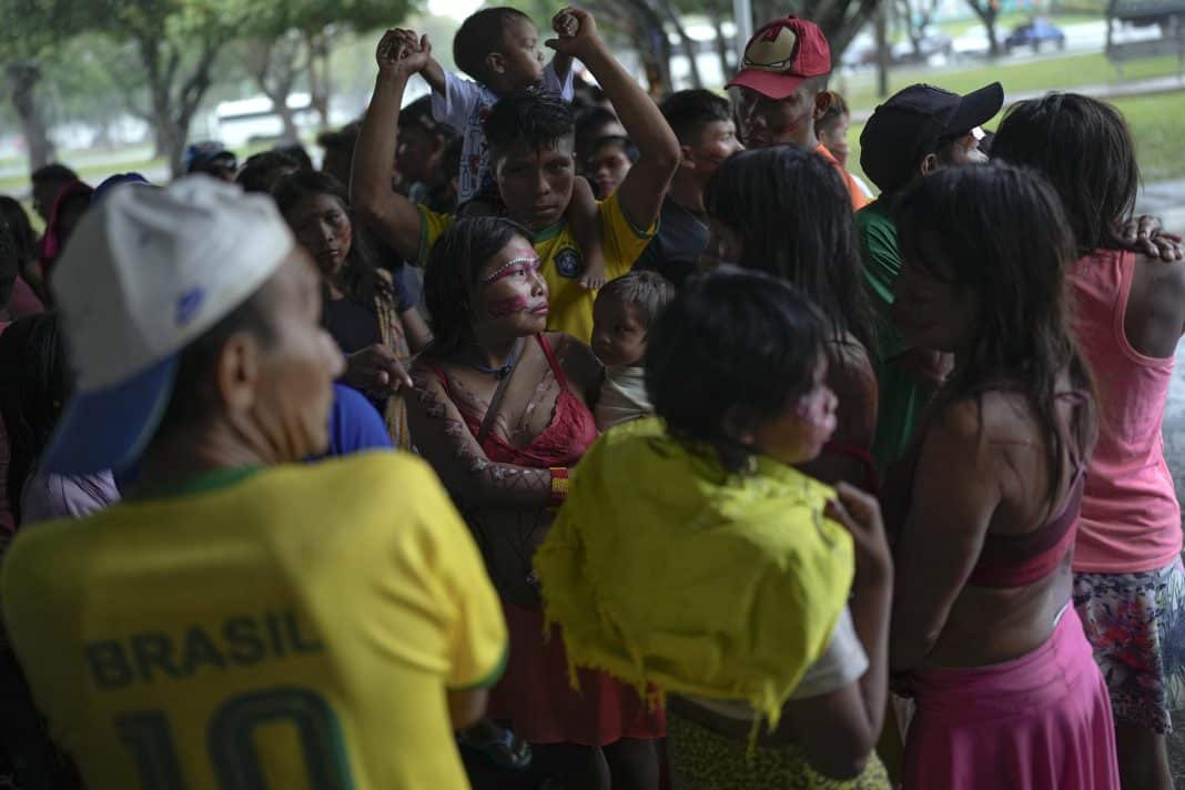 FILE - Yanomami Indigenous attend an event related to the annual Free Land Encampment protests, in Boa Vista, Roraima state, Brazil, April 25, 2023. Some 30,000 Yanomami live in Brazil's largest Indigenous territory, spanning more than 9 million hectares (22 million acres) in the northern area of the Amazon rainforest, along the border with Venezuela. (AP Photo/Matias Delacroix/File)