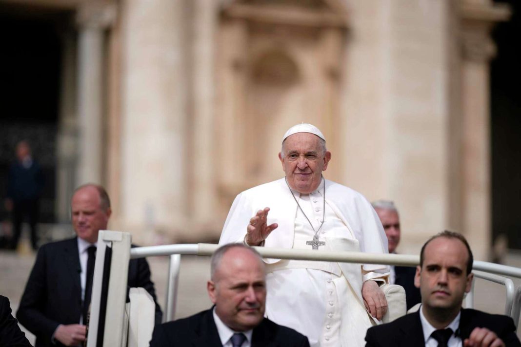 Pope Francis waves as he leaves after his weekly general audience in St. Peter's Square at The Vatican, Wednesday, April 10, 2024. Andrew Medichini/AP
