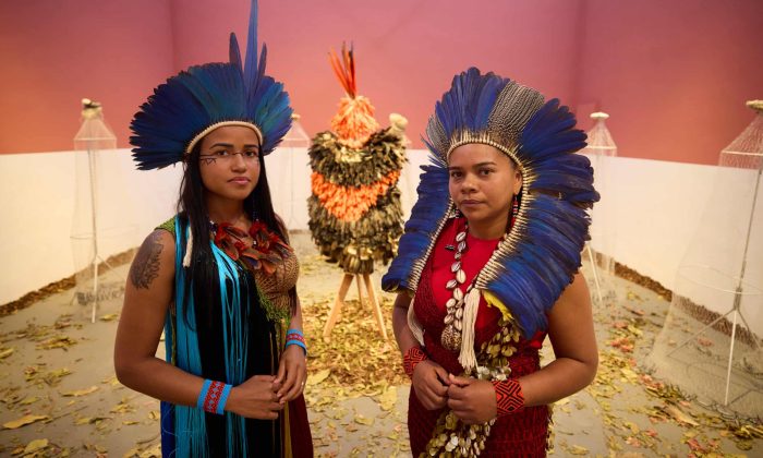 Glicéria Tupinambá (right, with her niece Jessica) in the Brazilian pavilion at Venice, which features the Tupinambá cloak, along with letters asking for its return. Photograph: David Levene/The Guardian