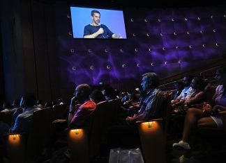 Through the Psychedelic Looking Glass An audience listens to NFL quarterback Aaron Rodgers talking about psychedelics at the Colorado Convention Center. (Helen H. Richardson/MediaNews Group/The Denver Post via Getty Images)