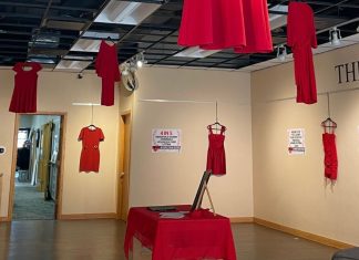 100 red dresses call attention to the Missing and Murdered Indigenous People Movement Red Dresses Exhibit in downtown Mt. Pleasant's Art ReachPhoto Courtesy the Mt. Pleasant Zonta Club