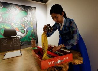 South Korea’s Ancient Tradition Revived with Social Media Lee Kyoung-hyun organizes tools for fortune-telling at her shaman parlour in Seoul, South Korea, May 13, 2024. (REUTERS/Kim Soo-hyeon)