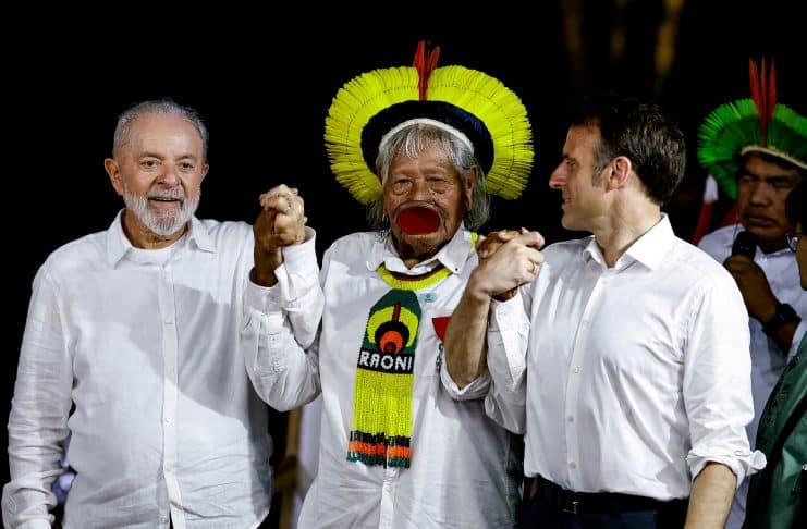 French President Emmanuel Macron and Brazil's President Luiz Inacio Lula da Silva attend a ceremony of presentation of the Legion of Honor to honor Brazil's indigenous chief Raoni Metuktire, at the Combu Island, near Belem, Brazil, March 26, 2024. REUTERS/Ueslei Marcelino/File Photo Purchase Licensing Rights