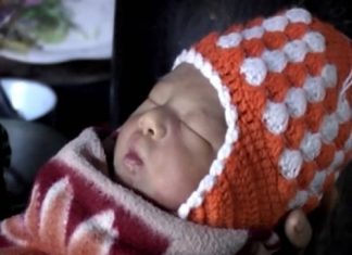 Naming ceremony of the Mong A naming ceremony for a Mong baby (Photo: Dantocmiennui.vn)