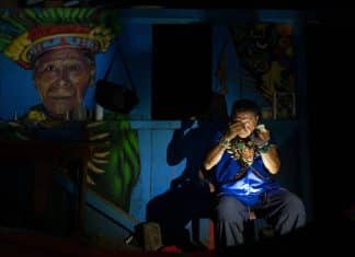 Ayahuasca tourism: the trouble with travelling to trip Isidro Lucitante, a healer of the indigenous Cofan ethnic group, gets ready for an ayahuasca ceremony in Avie village, in Lago Agrio, Sucumbíos Province, Amazon region, Ecuador. Image: PEDRO PARDO/AFP via Getty Images