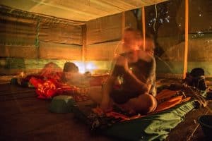 Peruvian Shaman Gilber Réategui conducts an ayahuasca ceremony for tourists in Caserio Nueva Luz de Fatima, Peru.Image: Manuel Medir/Getty Images