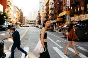 Photo of an Asian person crossing the street in a big city.For Alice Sparkly Kat, astrology is an evolving language that shapes how they see the world.

Photo by Mengwen Cao