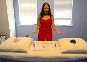 Spiritual mentor Daisy Tamberino performing a Reiki session at Earth Angel Crystal.Photo by Xintian Tina Wang
