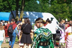 Jingle dress dancer Lauren Porter in the circle at 2024 Na-Me-Res powwow. When Porter dances in the powwow circle, the heartbeat — the sound of the drum — is the only thing she pays attention to. Dancing jingle helps her find a sense of healing, and she feels like a warrior putting on their armour when she wears her regalia.