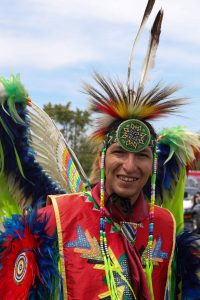 DJ White, a men’s fancy dancer, sees changes and additions to his regalia as a representation of growth. ‘It’s almost like a tree when they add a new layer of bark in their lives.’