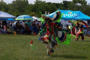 DJ White fancy dancing at the 2024 Na-Me-Res powwow in Toronto. White, who has been dancing for 20 years at powwows across Canada, expresses his community relationships through dance. “I also dance for the ones who can’t dance, the ones who are yet to come from the spirit world. And for those who have passed on, like some of my friends and my ancestors.”