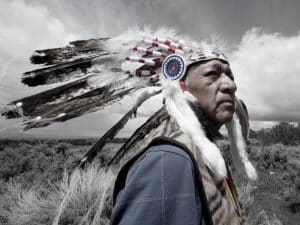 Rupert Steele of the Goshute tribe poses in a headdress.Rupert Steele, Goshute.Matika Wilbur
