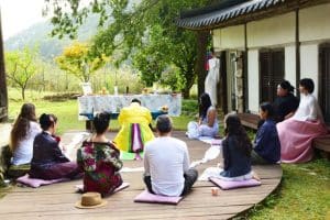 Helena Soholm performs a shamanic ritual before an altar at Ureuk World Music House in Chungju, North Chungcheong Province, Oct. 11. Courtesy of Bereket Alemayehu