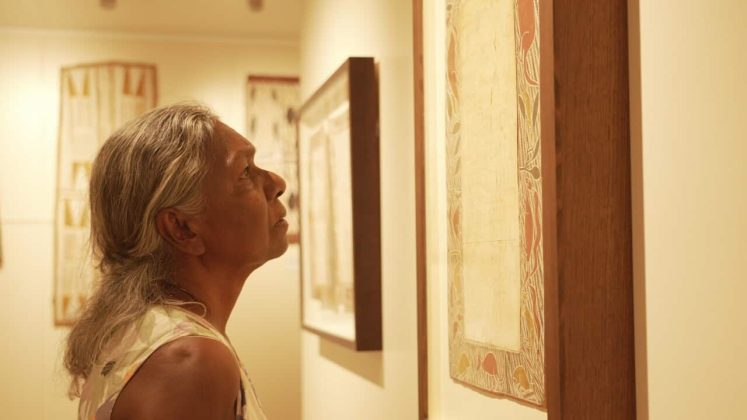 Merrkiyawuy Ganambarr-Stubbs reading the bark petition, after it was repatriated to Yirrkala in December, 2023. Credit: Matthew Garrick / ABC News / NITV