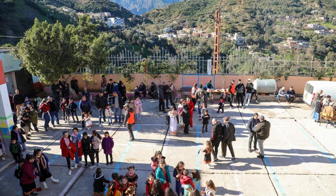 People attend a Tamechrit gathering, part of Algeria's Amazigh New Year's traditions, in Bajaia, on January 11, 2025. (AFP)
