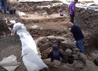 The Tomb of a Neolithic Shaman Woman from 10,000 Years Ago Who Had Six Fingers on Her Left Hand, Found in the Hills of Jerusalem Archaeologists excavating the shaman's tomb. Credit: Israel Antiquities Authority