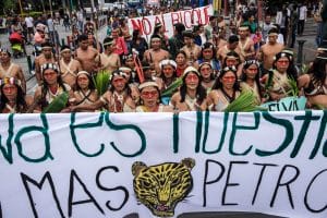 Waorani groups lead a march in February 2019 to file a lawsuit against the Ecuadorian government to protect their rainforest territory from oil drilling in Pastaza of the Ecuadorian Amazon. Credit: Mitch Anderson/Amazon Frontlines