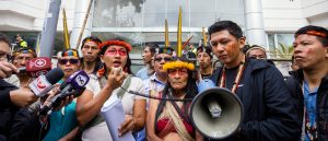 Silvana Nihua and Luis Enqueri (right), leaders of the Waorani organization OWAP, speak at a press conference outside the Constitutional Court of Ecuador in 2024. Credit: Karen Toro/Amazon Frontlines