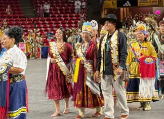 ASU Powwow bridges generations as anti-DEI policies threaten Indigenous cultural erasure Arizona State University Powwow royalty lead a grand entry march into the event at Desert Financial Arena in Tempe on April 6, 2025.